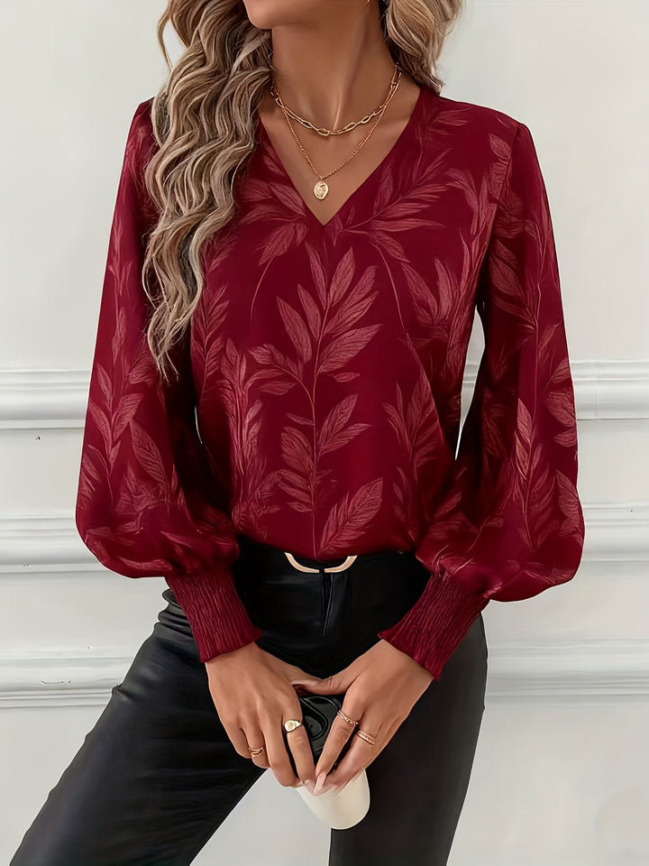 Blusa de mulher com decote em V e mangas balão