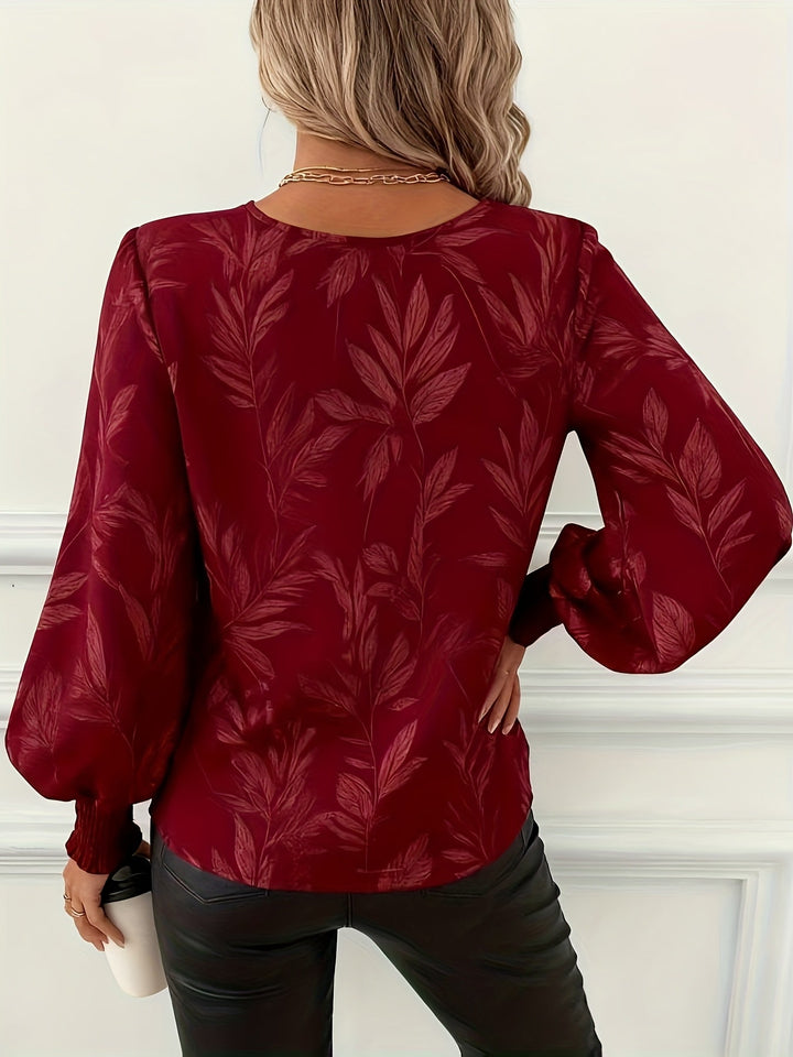Blusa de mulher com decote em V e mangas balão