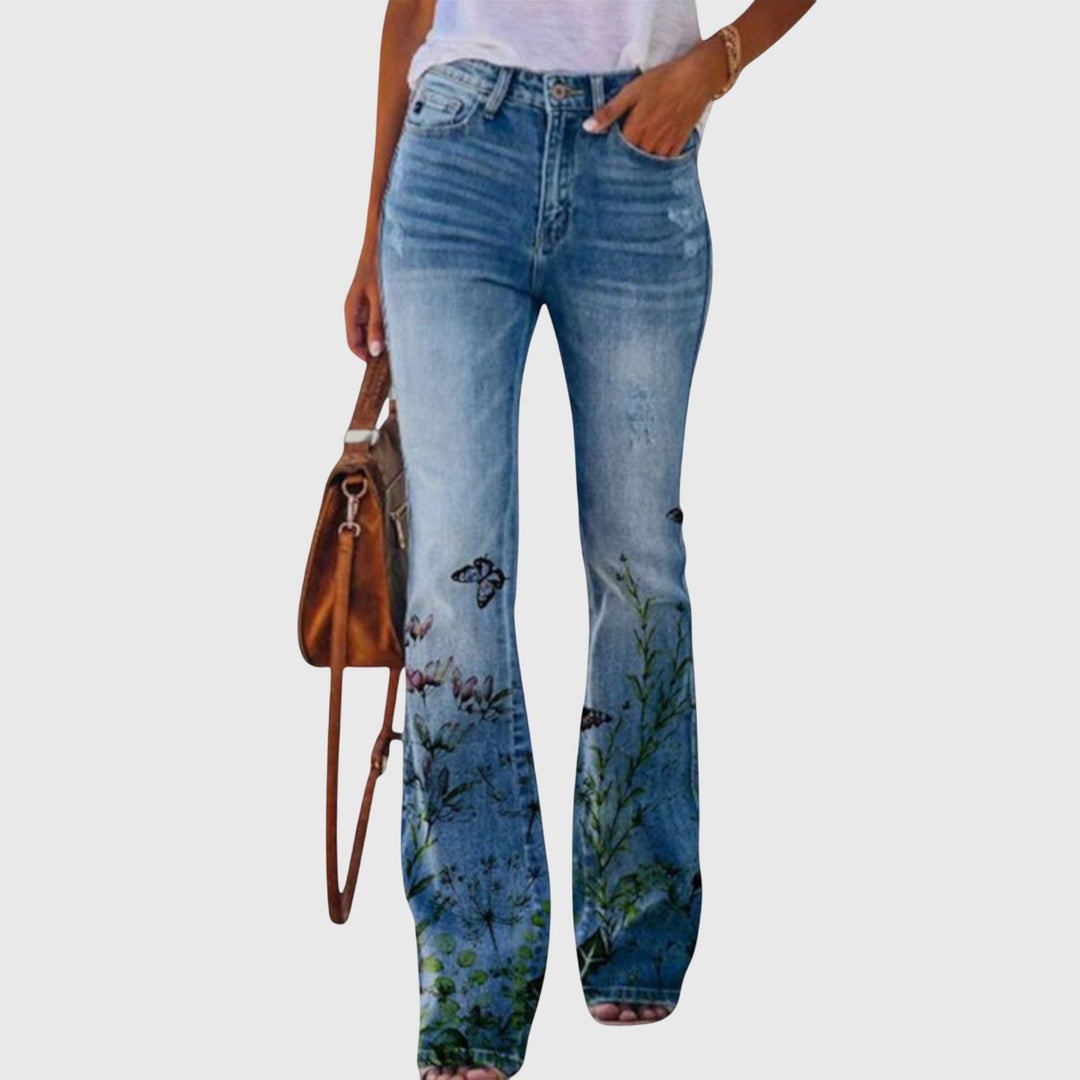 Flared jeans til dame med blomstermønster