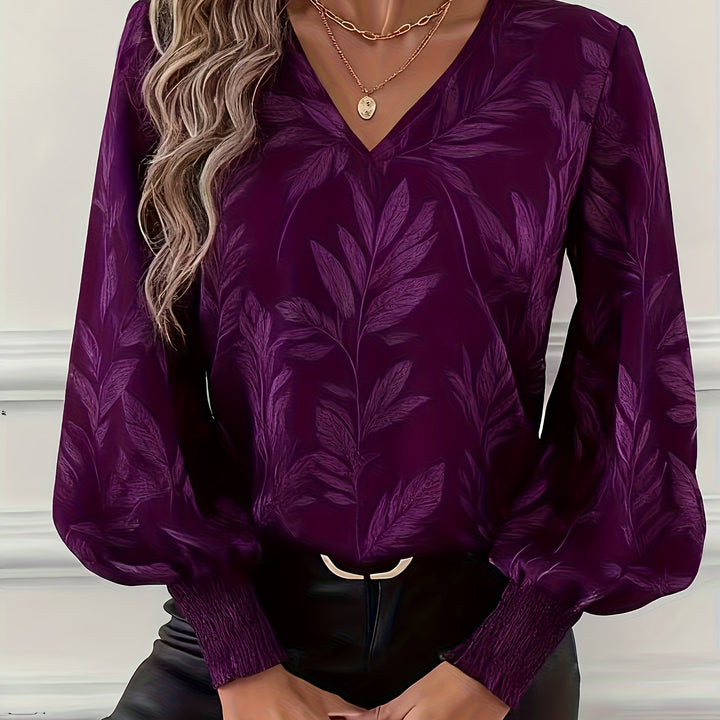 Blusa de mulher com decote em V e mangas balão