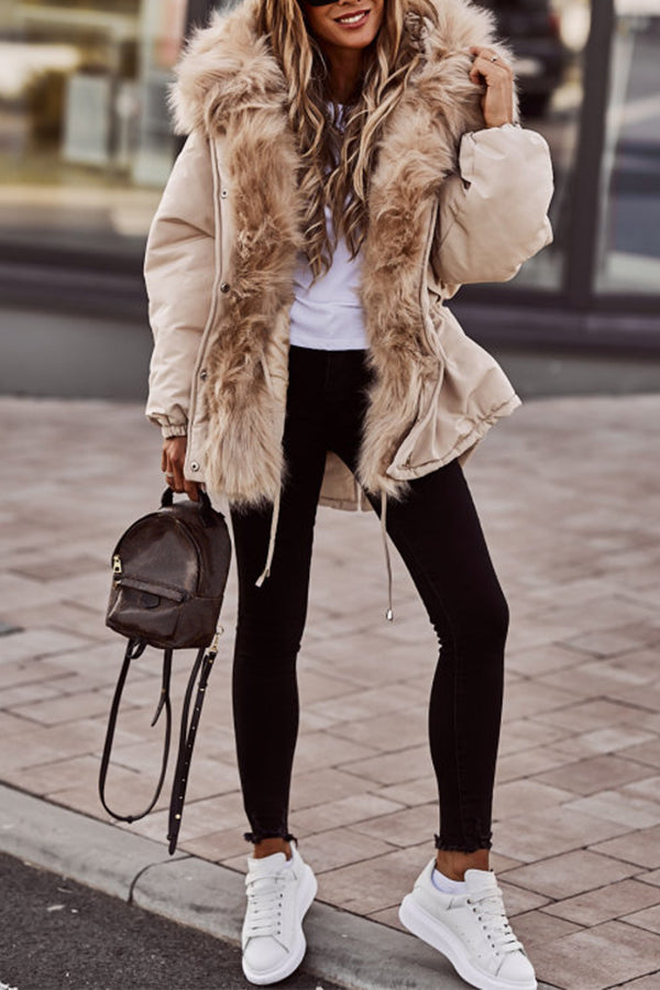 Women's quilted hooded parka in faux fur