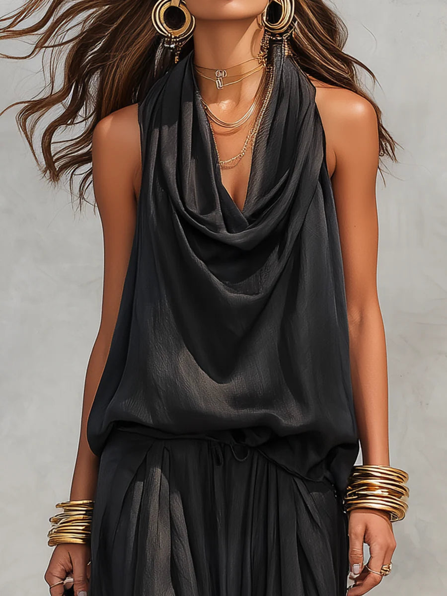 Tuta sarouel in raso nero da donna