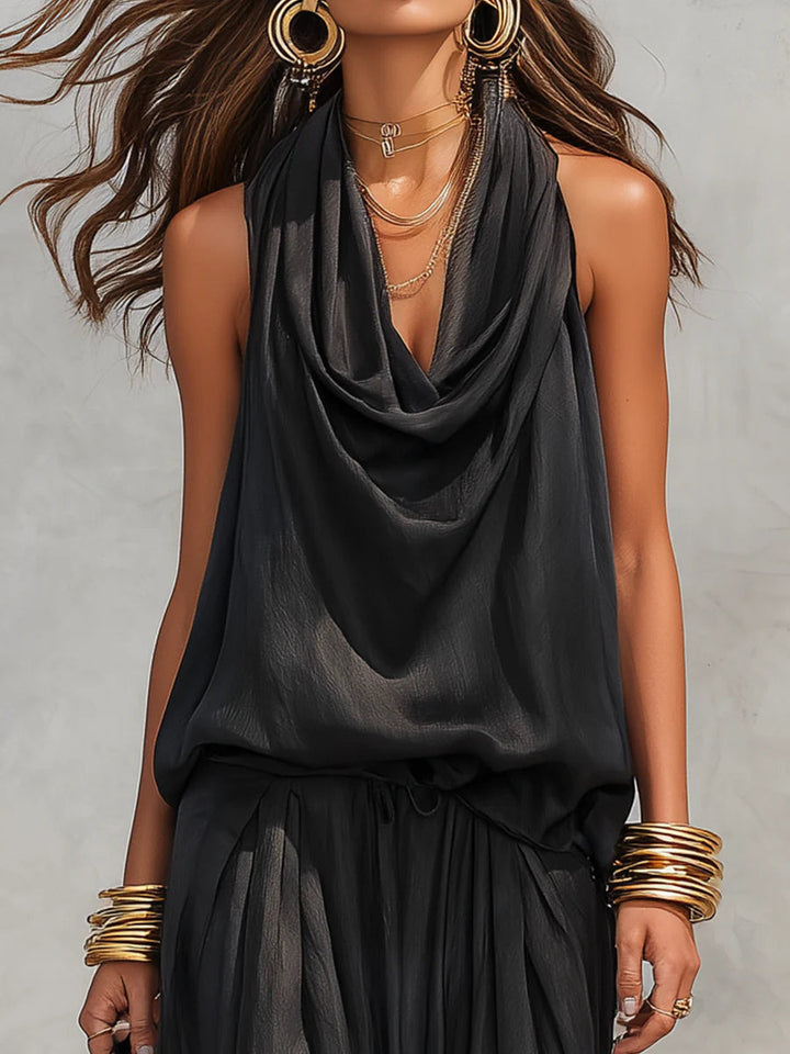 Tuta sarouel in raso nero da donna