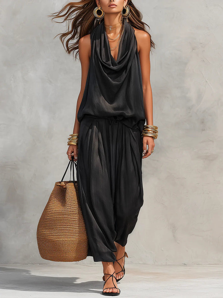 Tuta sarouel in raso nero da donna