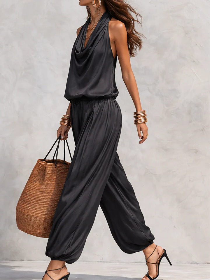 Tuta sarouel in raso nero da donna