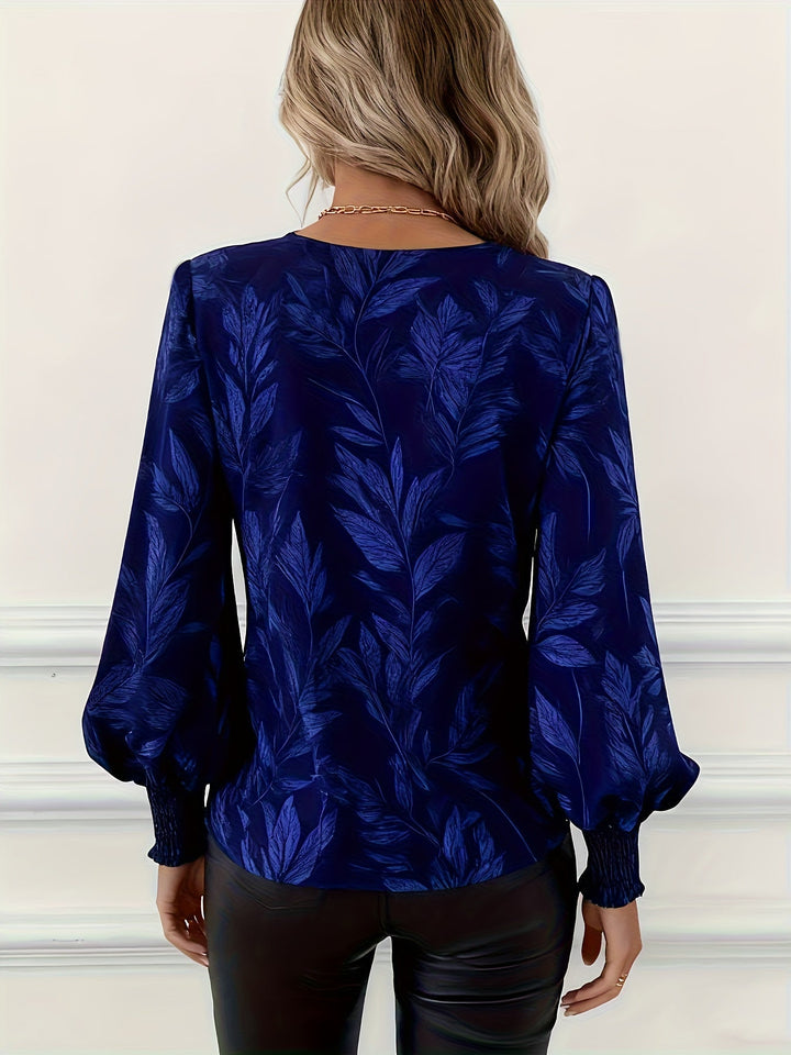 Blusa de mulher com decote em V e mangas balão