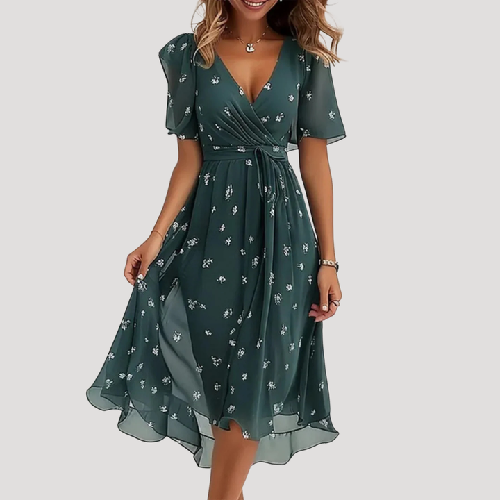 Abito midi a portafoglio da donna con motivi floreali e gonna fluida