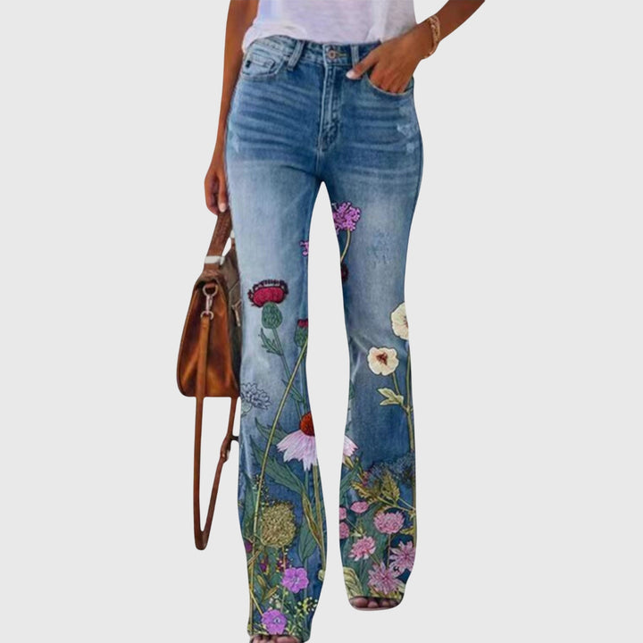 Flared jeans til dame med blomstermønster