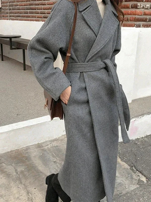 Abrigo cruzado elegante para mujer con solapas y cinturón