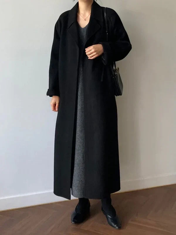 Abrigo cruzado elegante para mujer con solapas y cinturón